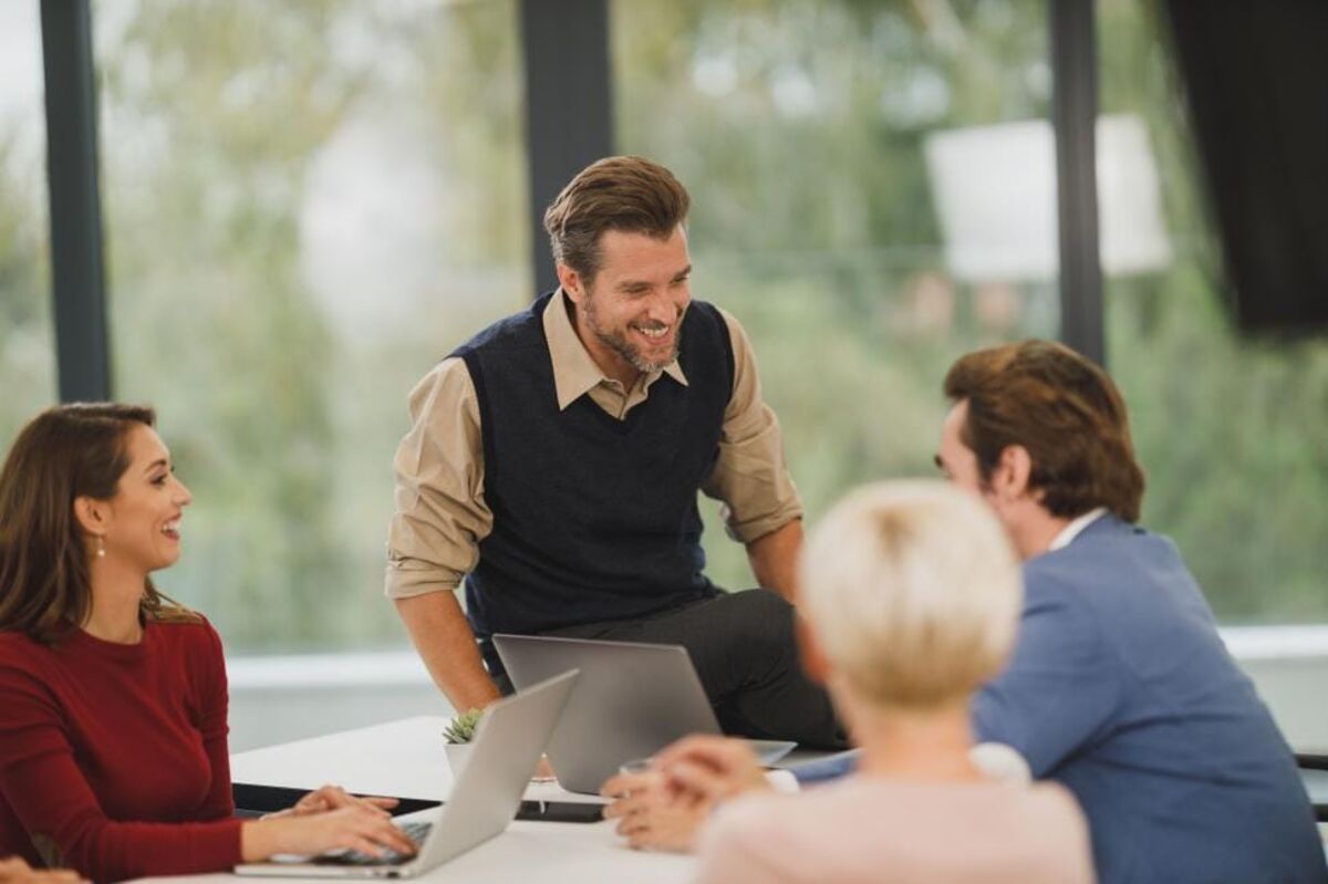 Colleagues collaborating in a bright office